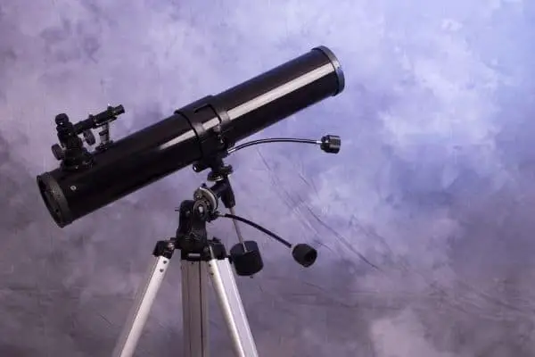 Black telescope on mount