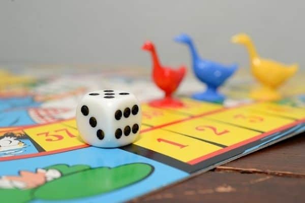 Board game with dice and ducks