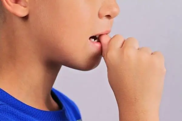 kid biting nails