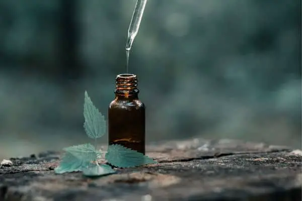 A Bottle Of Essential Oil With A Dropper